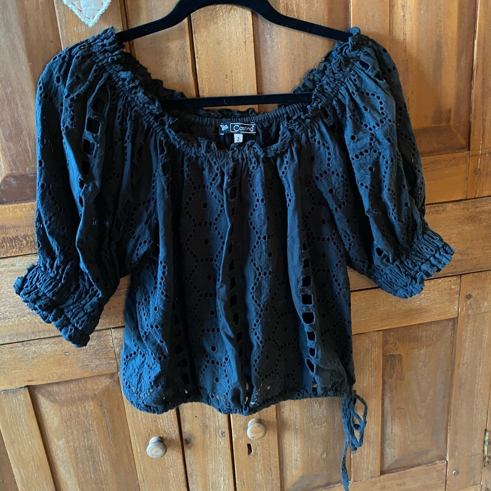 Black cotton lace top. Drawstring waist.